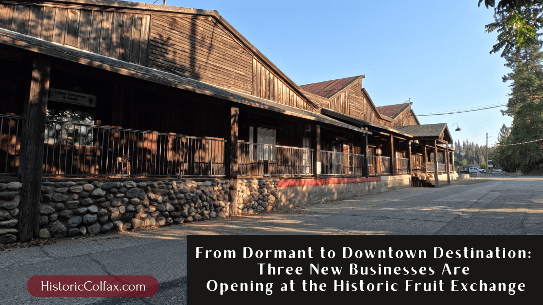 Historic Fruit Exchange Building at 229 Railroad Street in downtown Colfax California with grand opening signage for three new vintage and antique shops