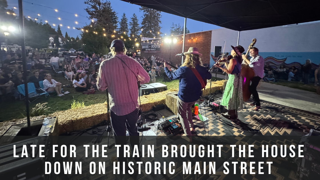 Crowd gathered on Historic Main Street in Colfax, CA for the Late for the Train concert